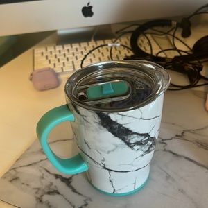 Barely used swig cup.